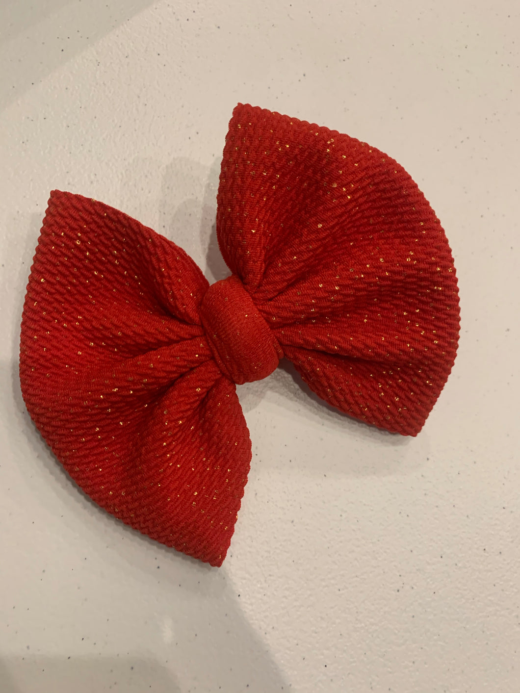 Red sparkle bow